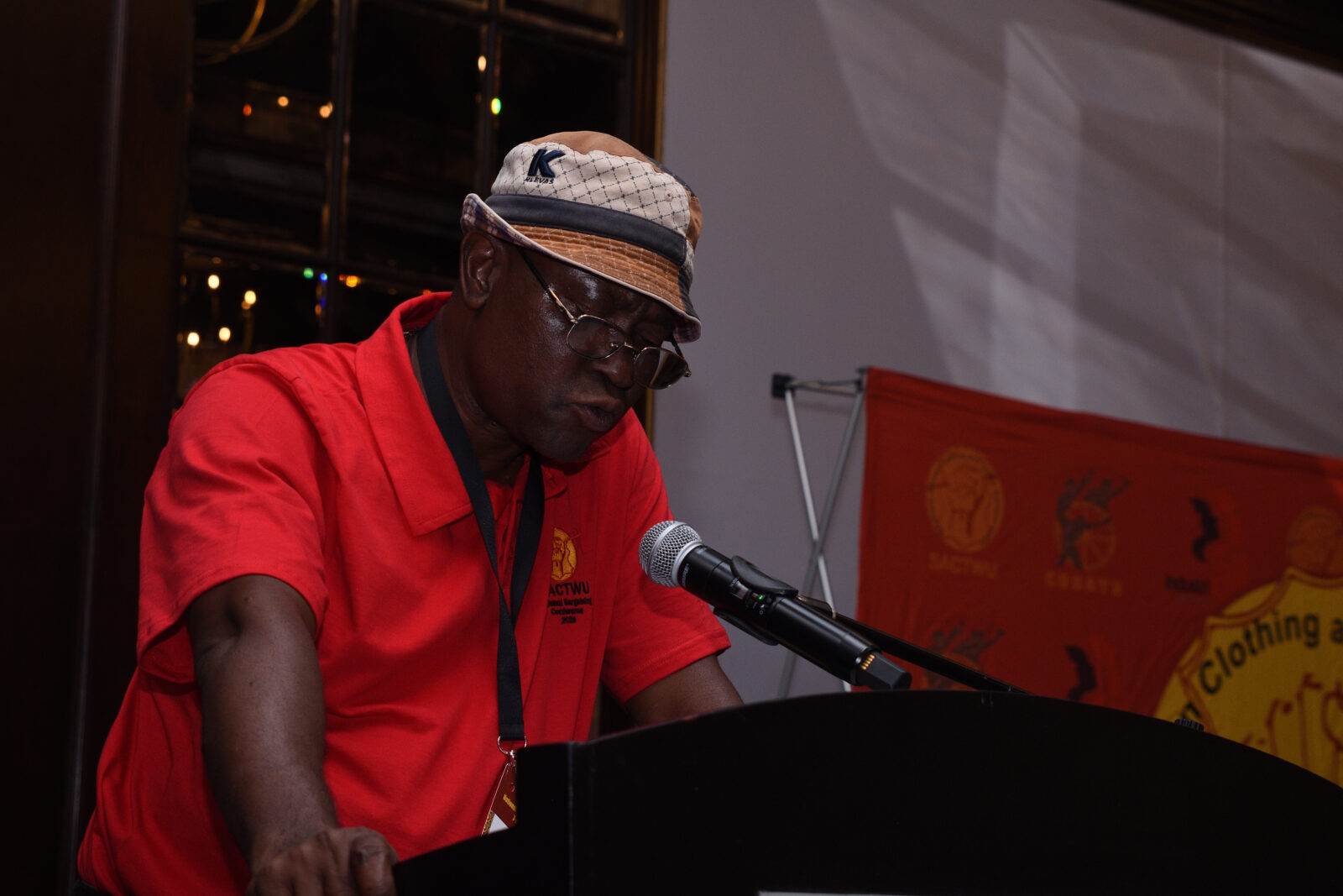 Michael Shabalala, SACTWU 2nd national organising secretary, at the podium with SACTWU banner behind him, Cape Town, March 2026