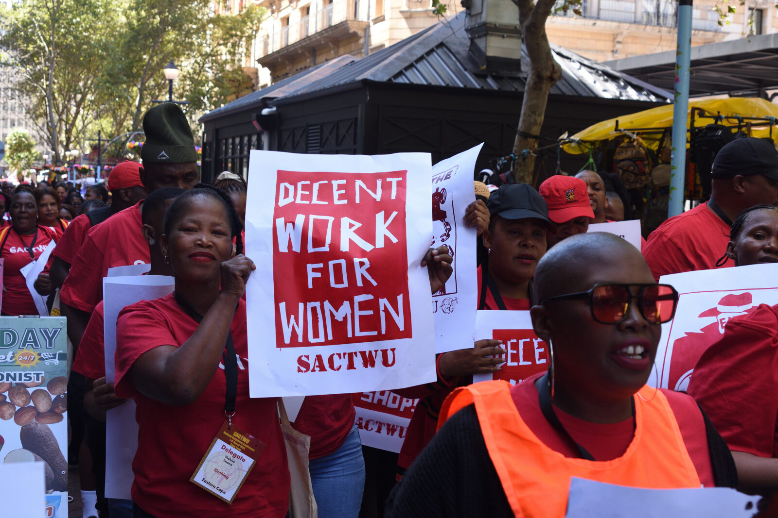 SACTWU workers marching in Cape Town with Break the Chains in our Supply Chains placard, March 2026