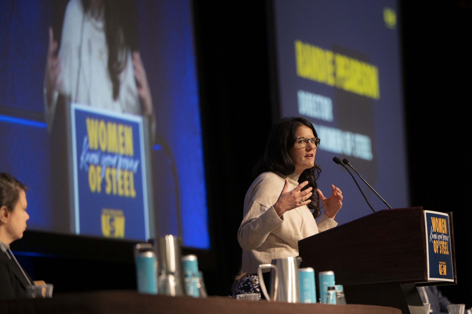 Randie Pierson at the podium during the opening session of the USW Women of Steel Conference in Toronto, March 2026.