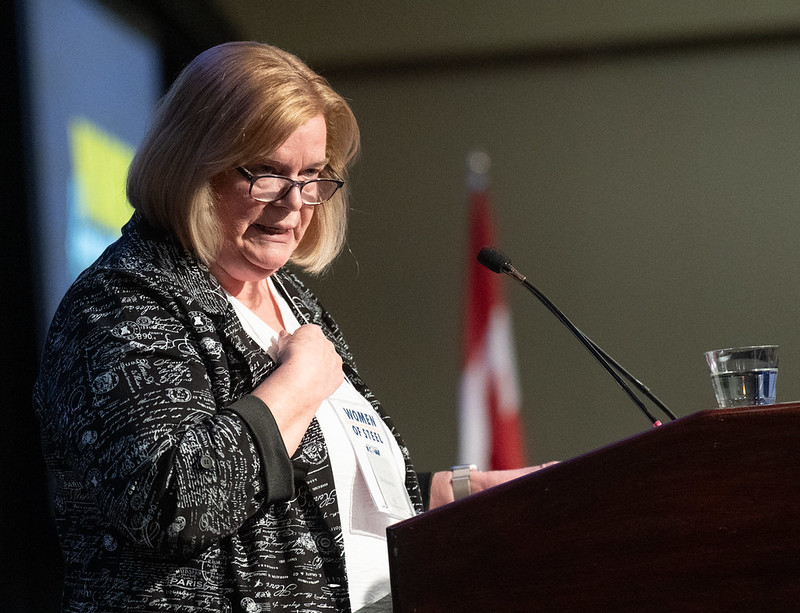 Carol Landry speaks at the podium at the opening of the USW Women of Steel Conference in Toronto, March 2026